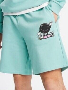 Crooked Tongues Relaxed Teal Shorts Featuring A Bowling Graphic